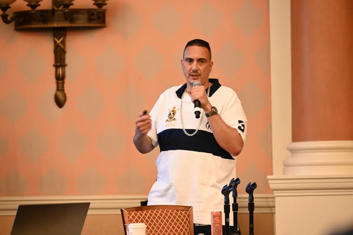 Mike Merlino speaking at a marketing event